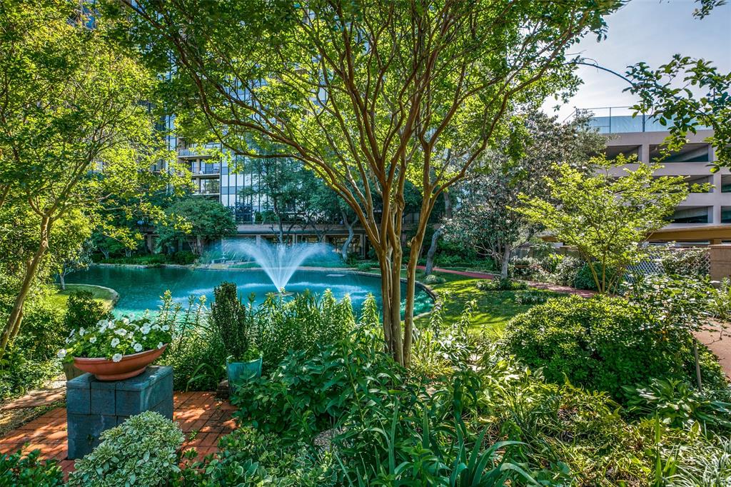5200 Keller Springs Road, Unit 820 Dallas, TX 75248 - Photo 31 of 40 a view of a garden with large trees