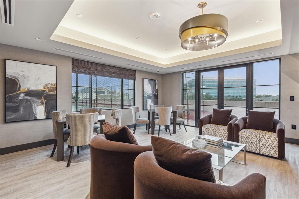 5200 Keller Springs Road, Unit 820 Dallas, TX 75248 - Photo 38 of 40 a living room with furniture and a large window