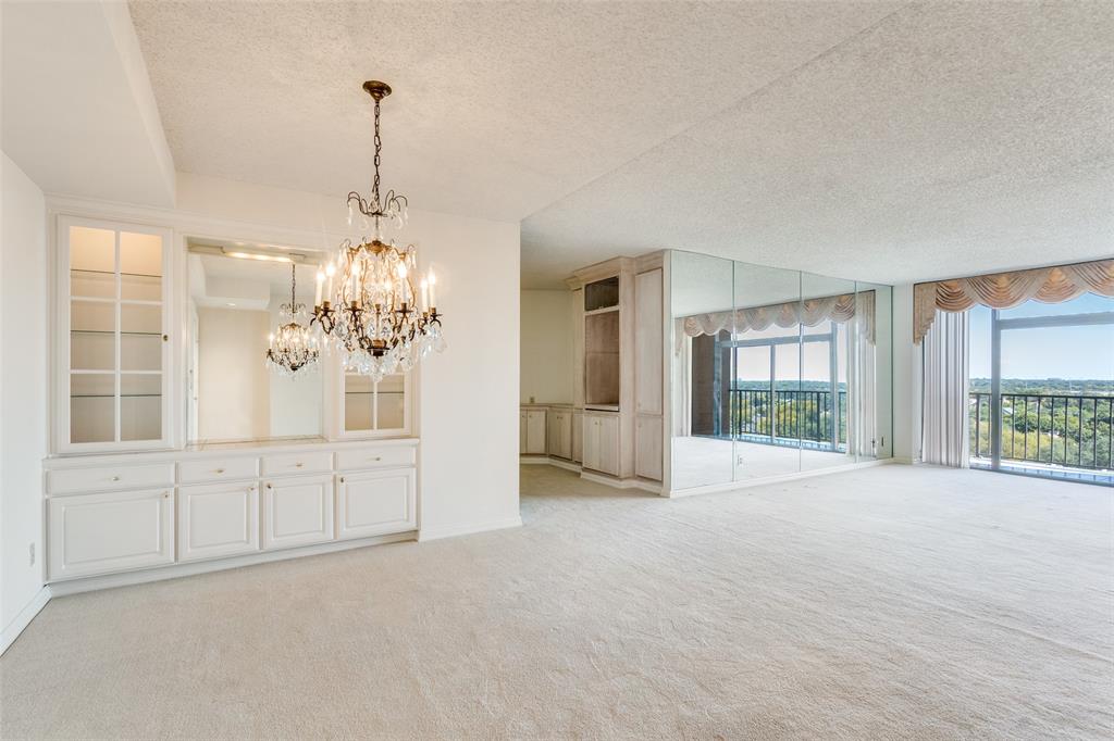 5200 Keller Springs Road, Unit 820 Dallas, TX 75248 - Photo 7 of 40 a view of an empty room with a window