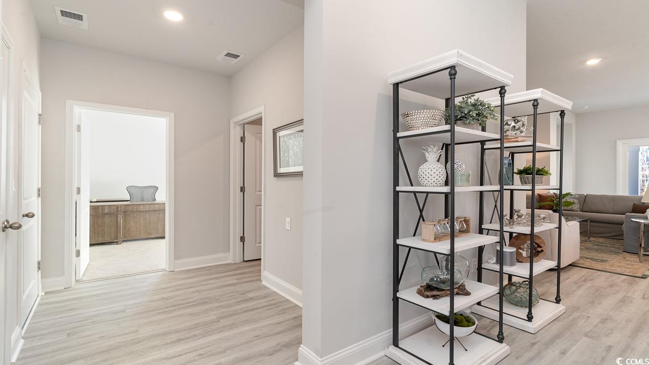 125 Fair Meadow Loris, SC 29569 - Photo 7 of 26 Hallway with light wood-type flooring