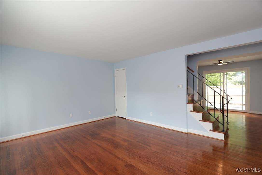 3109 North Parham Road, Unit 40 Henrico, VA 23294 - Photo 13 of 40 a view of an empty room with wooden floor and a window