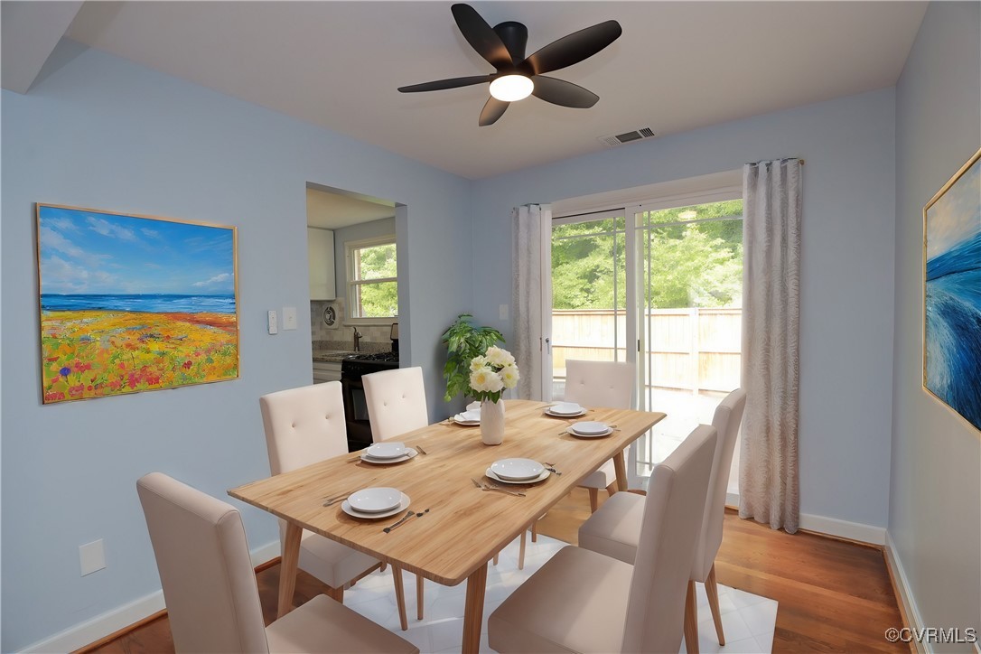 3109 North Parham Road, Unit 40 Henrico, VA 23294 - Photo 14 of 40 a view of a dining room with furniture window and outside view