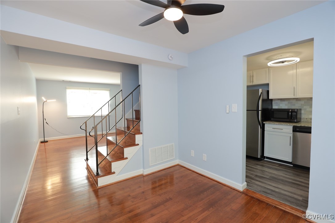 3109 North Parham Road, Unit 40 Henrico, VA 23294 - Photo 17 of 40 a view of an entryway with wooden floor and cabinets