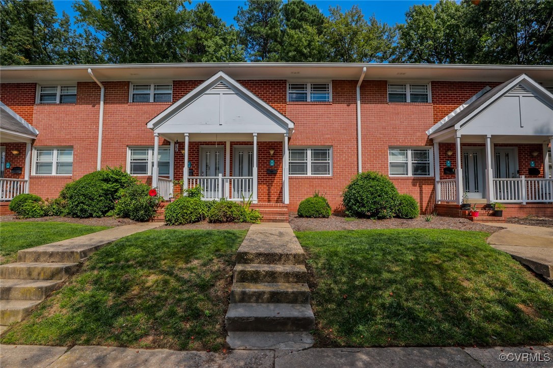 3109 North Parham Road, Unit 40 Henrico, VA 23294 - Photo 2 of 40 front view of a house next to a yard