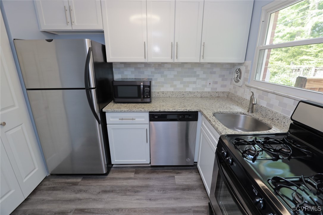 3109 North Parham Road, Unit 40 Henrico, VA 23294 - Photo 24 of 40 a kitchen with a sink appliances a counter space and a window