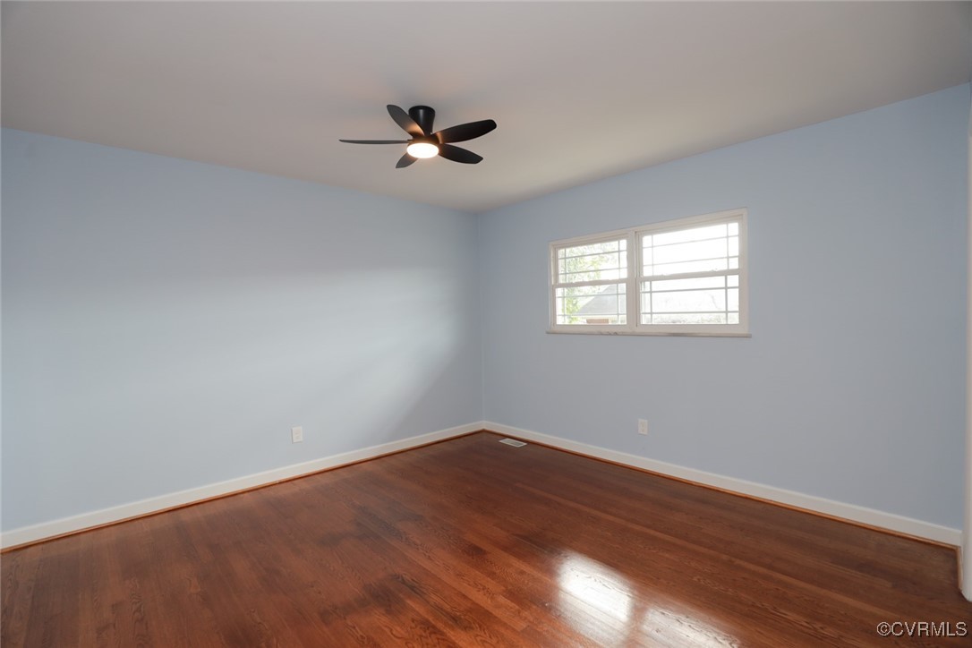 3109 North Parham Road, Unit 40 Henrico, VA 23294 - Photo 26 of 40 a view of a room with wooden floor and windows