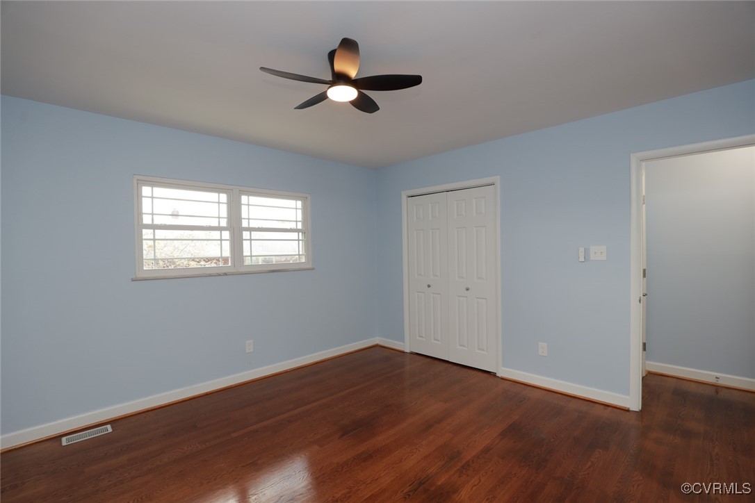 3109 North Parham Road, Unit 40 Henrico, VA 23294 - Photo 27 of 40 wooden floor in an empty room with a window