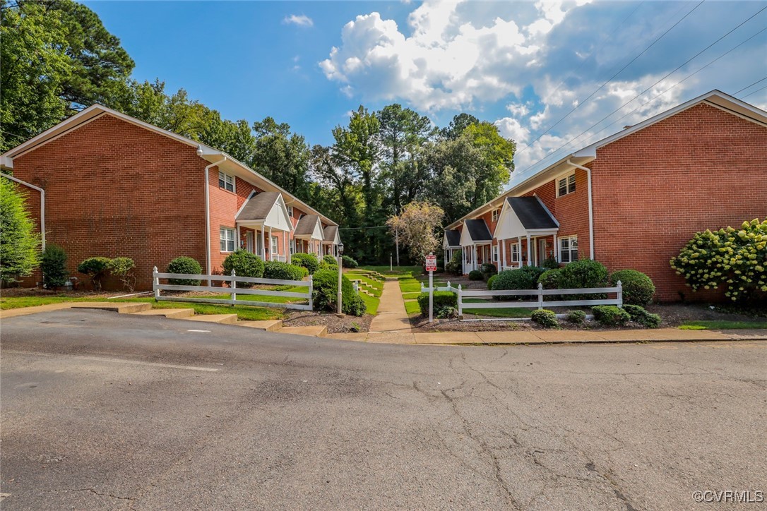3109 North Parham Road, Unit 40 Henrico, VA 23294 - Photo 40 of 40 a view of a house with a yard and plants