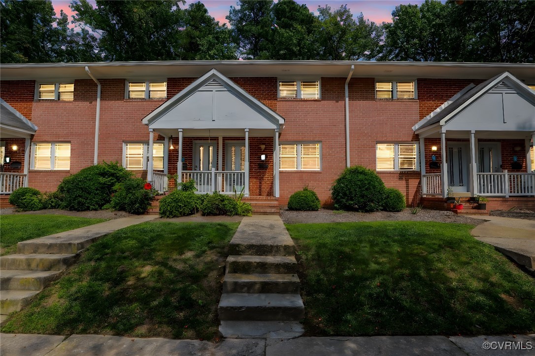3109 North Parham Road, Unit 40 Henrico, VA 23294 - Photo 7 of 40 a front view of a house with a yard
