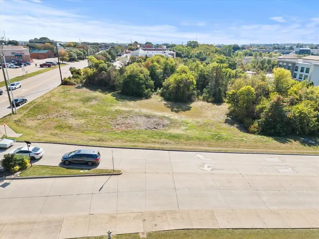 a view of swimming pool with an outdoor seating