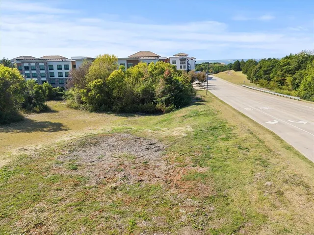 a view of a lake with a city