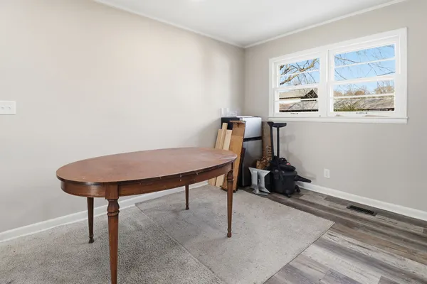 a room with furniture and a window