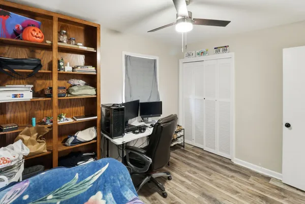 a view of a workspace with furniture