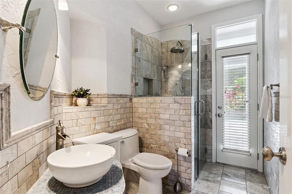 2125 Kane Park Way Windermere, FL 34786 - Photo 34 of 63 a bathroom with a toilet sink and shower