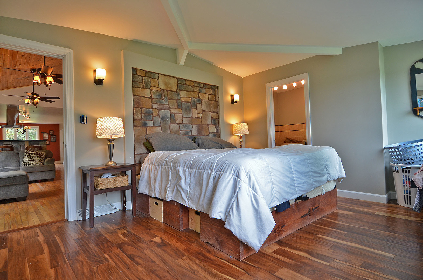 2580 East 1251st Road Ottawa, IL 61350 - Photo 20 of 29 a bedroom with a bed and wooden floor