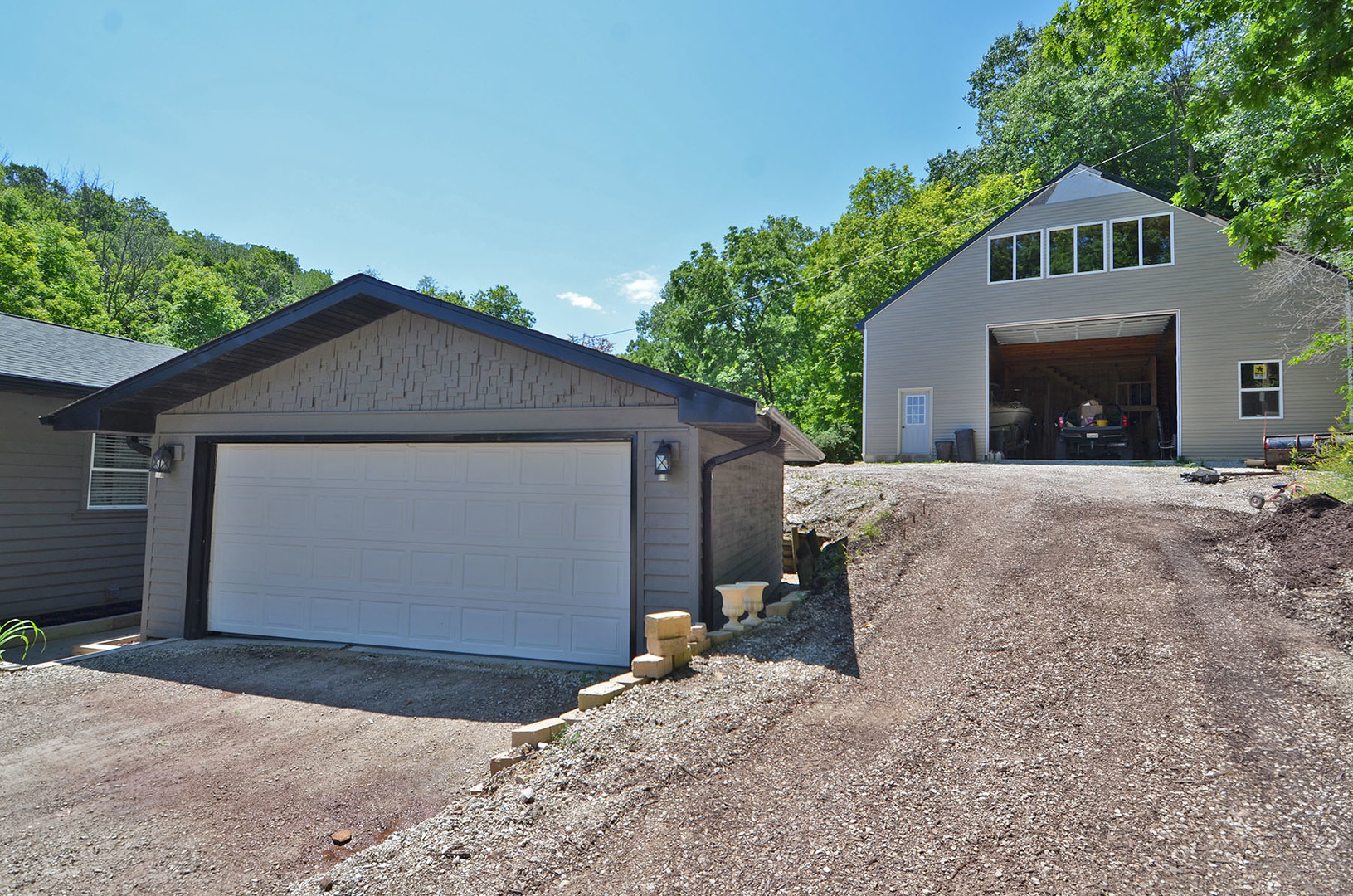 2580 East 1251st Road Ottawa, IL 61350 - Photo 3 of 29 a front view of a house with a yard and garage