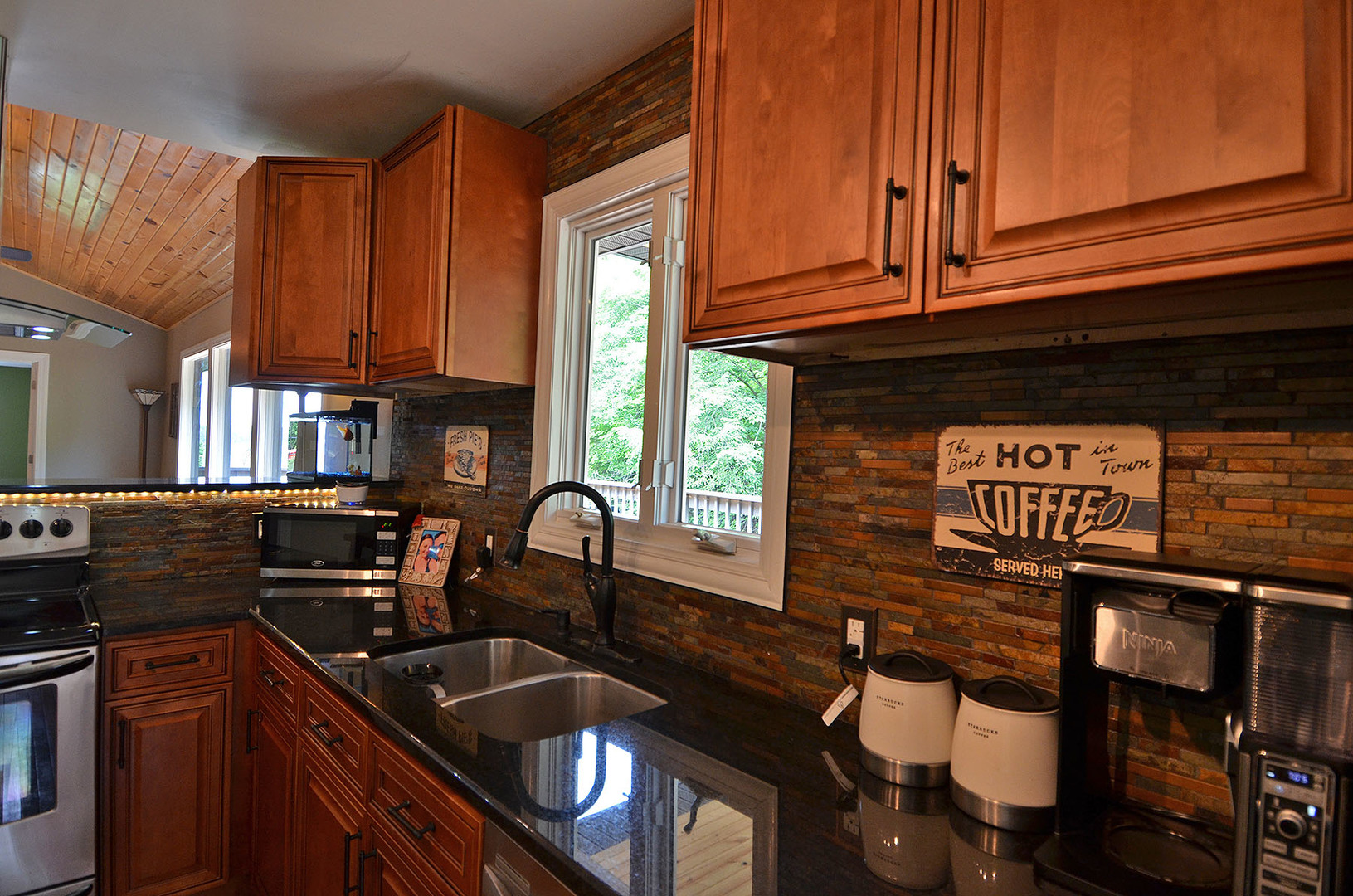 2580 East 1251st Road Ottawa, IL 61350 - Photo 7 of 29 a kitchen with granite countertop a sink and a cabinets
