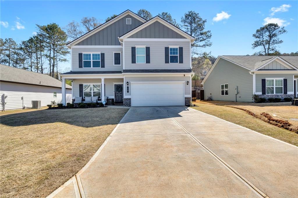16 Brooke Court Southeast Rome, GA 30161 - Photo 1 of 1 a front view of a house with a yard