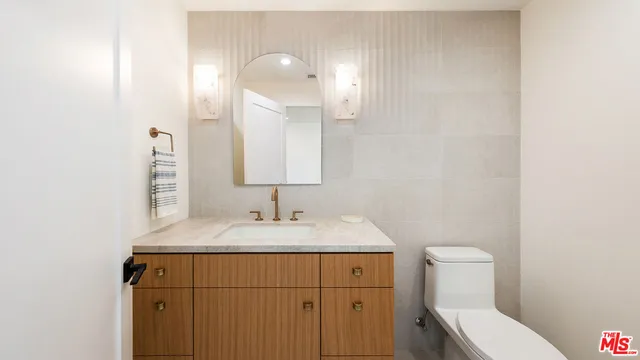 a view of a swimming pool with an outdoor seating