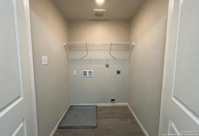 a view of a room with racks on the wall