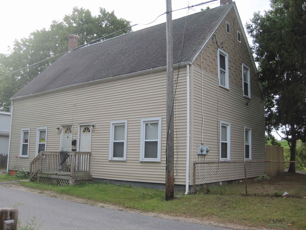 265-267 Water Street Springfield, MA 01151 - Photo 1 of 23 a view of a house with a yard