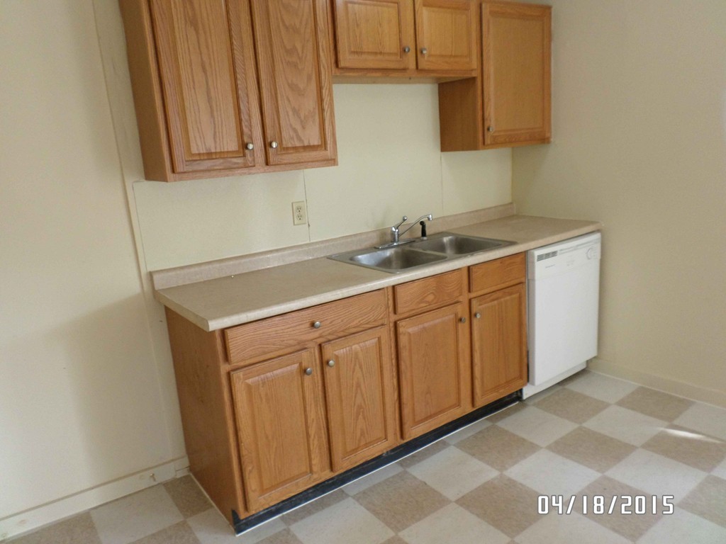 265-267 Water Street Springfield, MA 01151 - Photo 11 of 23 a room with a sink cabinets and utility