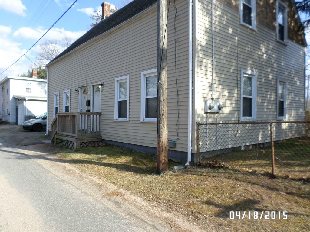 265-267 Water Street Springfield, MA 01151 - Photo 14 of 23 a view of a house with a yard