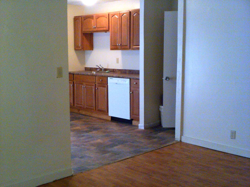 265-267 Water Street Springfield, MA 01151 - Photo 4 of 23 a view of a kitchen with a sink and a stove