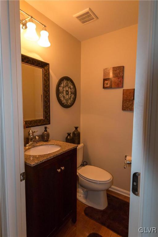 8785 Pathfinder Road Breinigsville, PA 18031 - Photo 12 of 28 First-floor half bath with hardwood and upgraded s