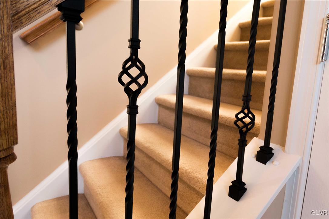 8785 Pathfinder Road Breinigsville, PA 18031 - Photo 13 of 28 Upgraded decorate railings throughout.