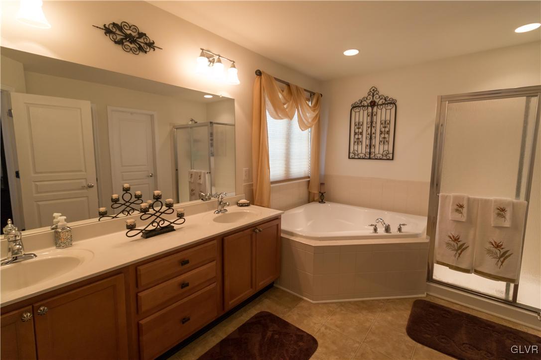 8785 Pathfinder Road Breinigsville, PA 18031 - Photo 16 of 28 Double vanity, huge soaking tub, large linen close