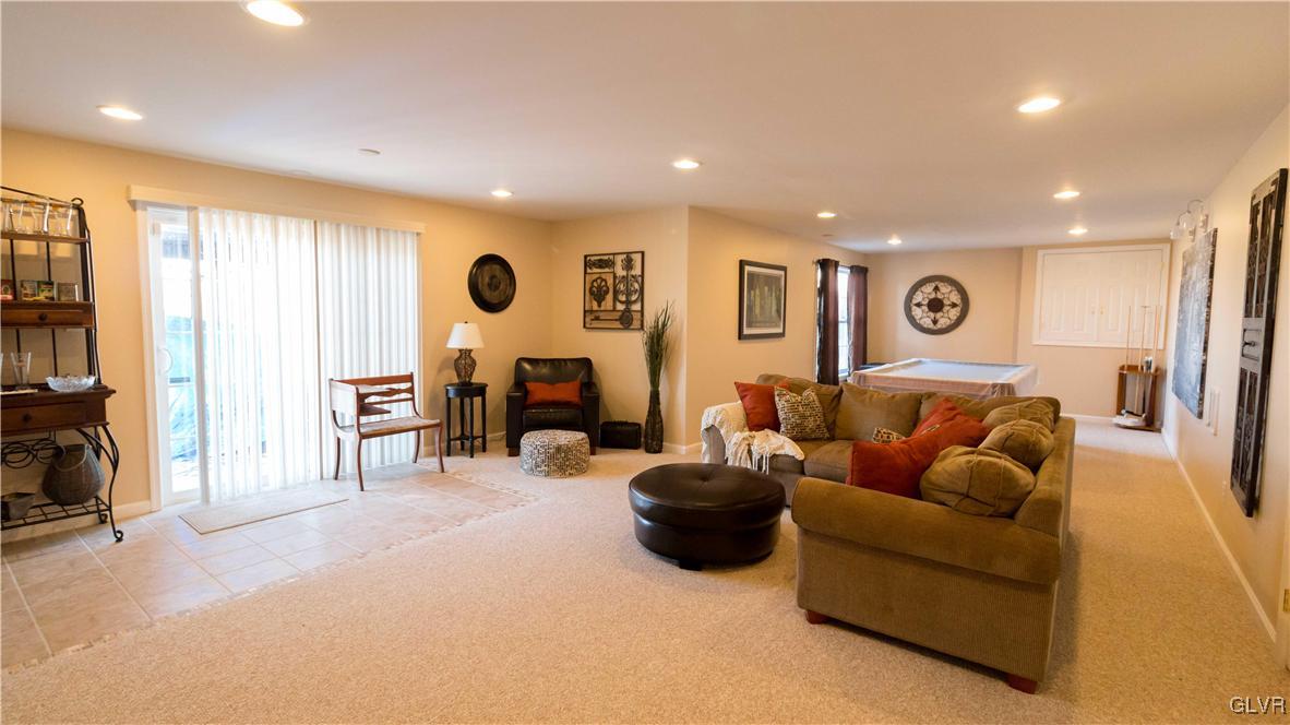 8785 Pathfinder Road Breinigsville, PA 18031 - Photo 21 of 28 Huge finished basement, walkout to private patio/g