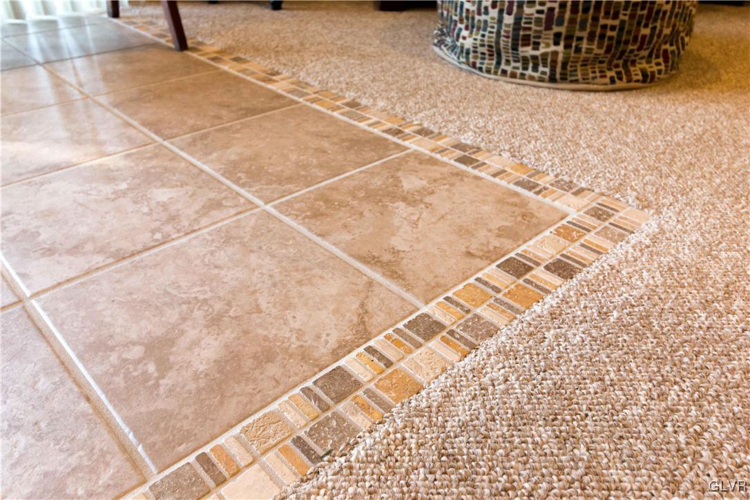8785 Pathfinder Road Breinigsville, PA 18031 - Photo 23 of 28 Decorative upgrades to basement flooring. Inclusio