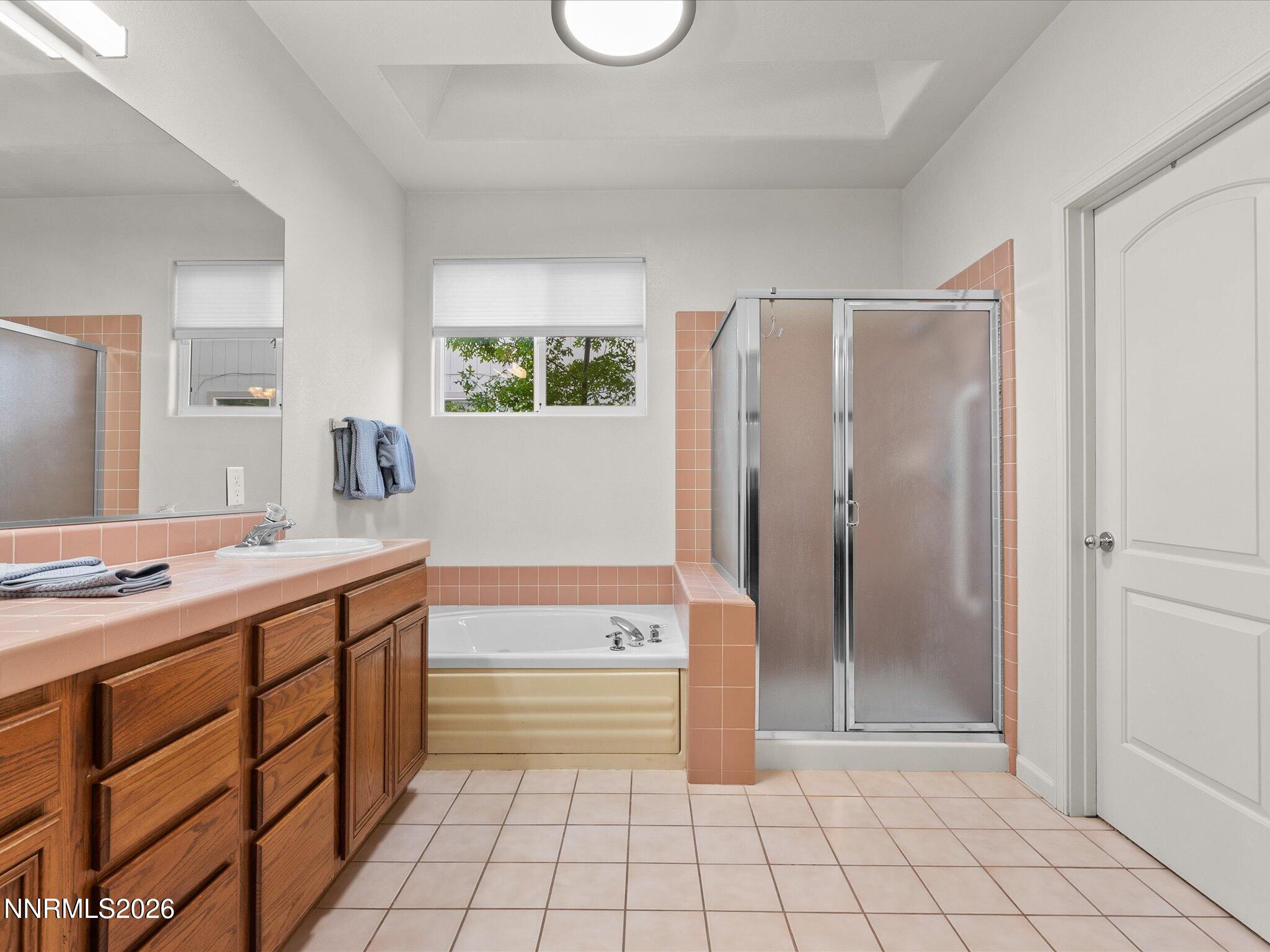 3101 Green River Drive Reno, NV 89503 - Photo 27 of 62 a spacious bathroom with a shower and a sink