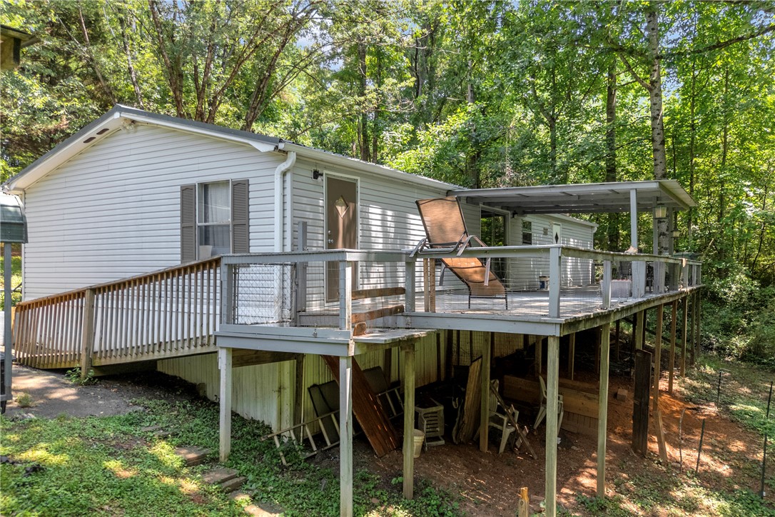 162 Newberry Road Walhalla, SC 29691 - Photo 36 of 50 A private deck overlooking a verdant hillside, perfect for tranquil outdoor enjoyment.