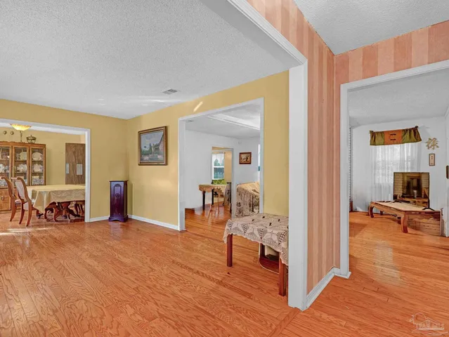 a view of a livingroom with furniture and a livingroom