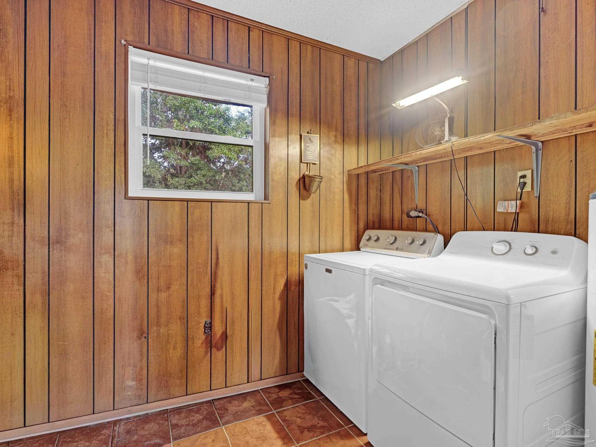 4112 Croydon Road Pensacola, FL 32514 - Photo 17 of 25 a utility room with dryer and washer