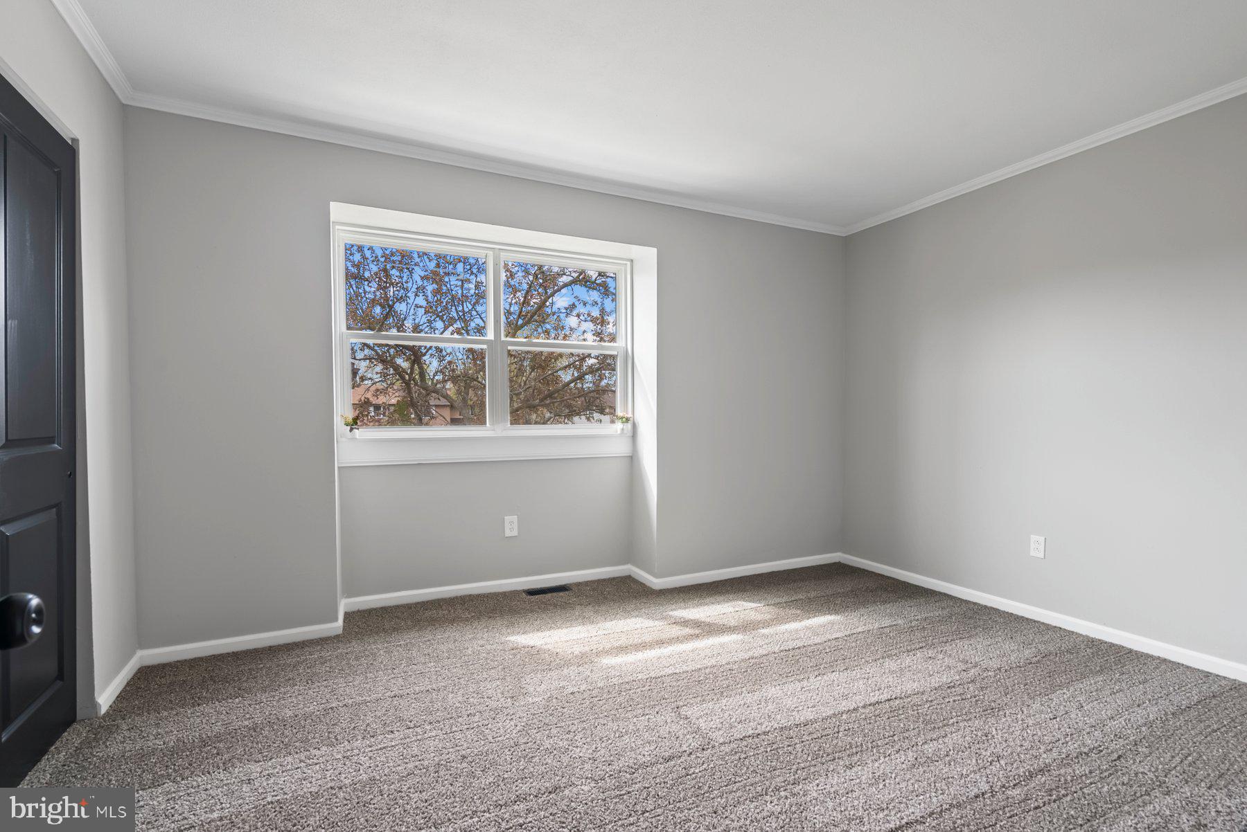 261 Via Cascata Drive Clementon, NJ 08021 - Photo 17 of 26 a view of a big room with wooden floor and windows