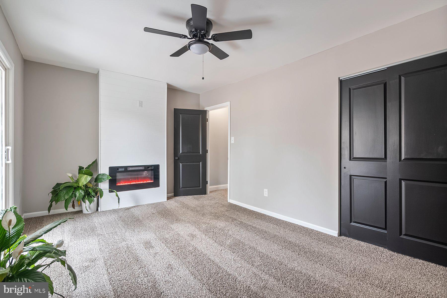 261 Via Cascata Drive Clementon, NJ 08021 - Photo 18 of 26 a view of a kitchen with a refrigerator and a potted plant