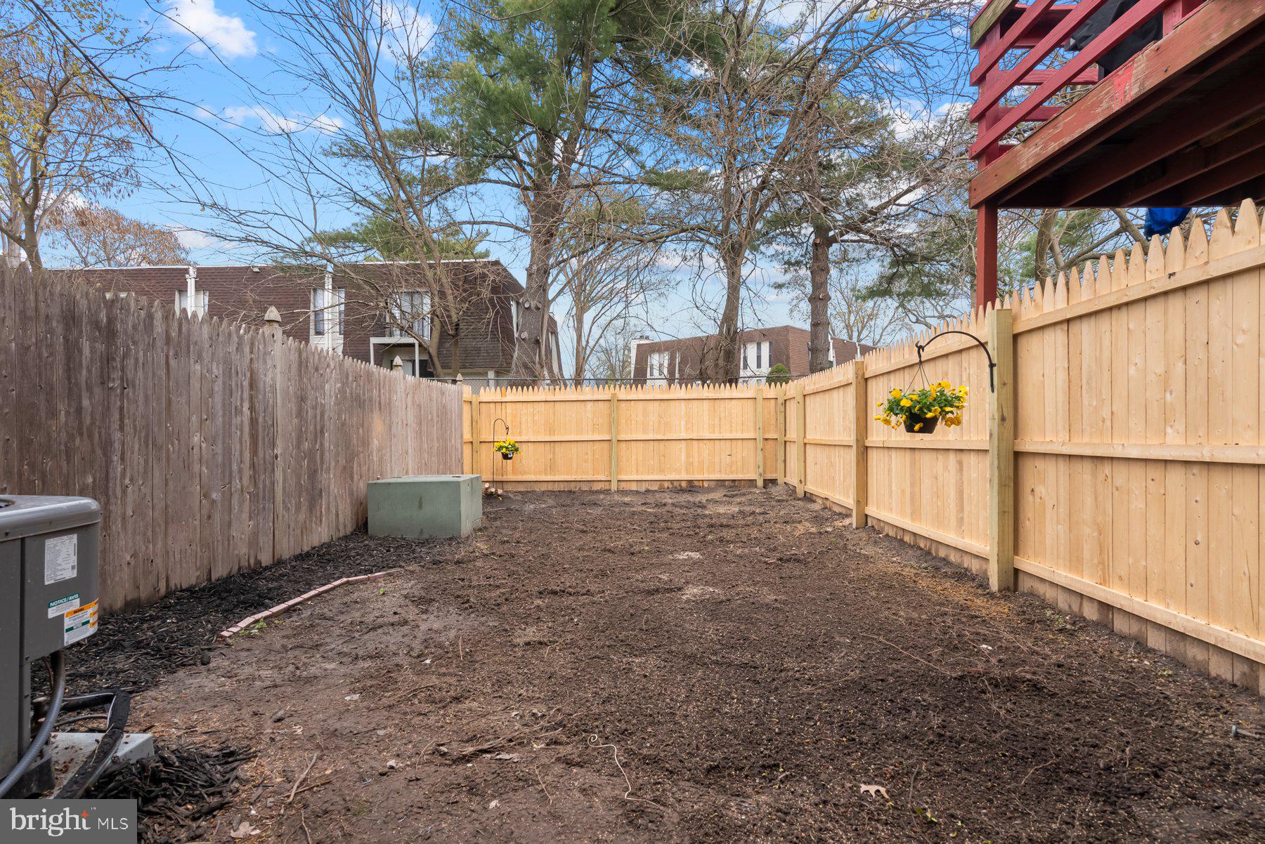 261 Via Cascata Drive Clementon, NJ 08021 - Photo 24 of 26 a view of a backyard
