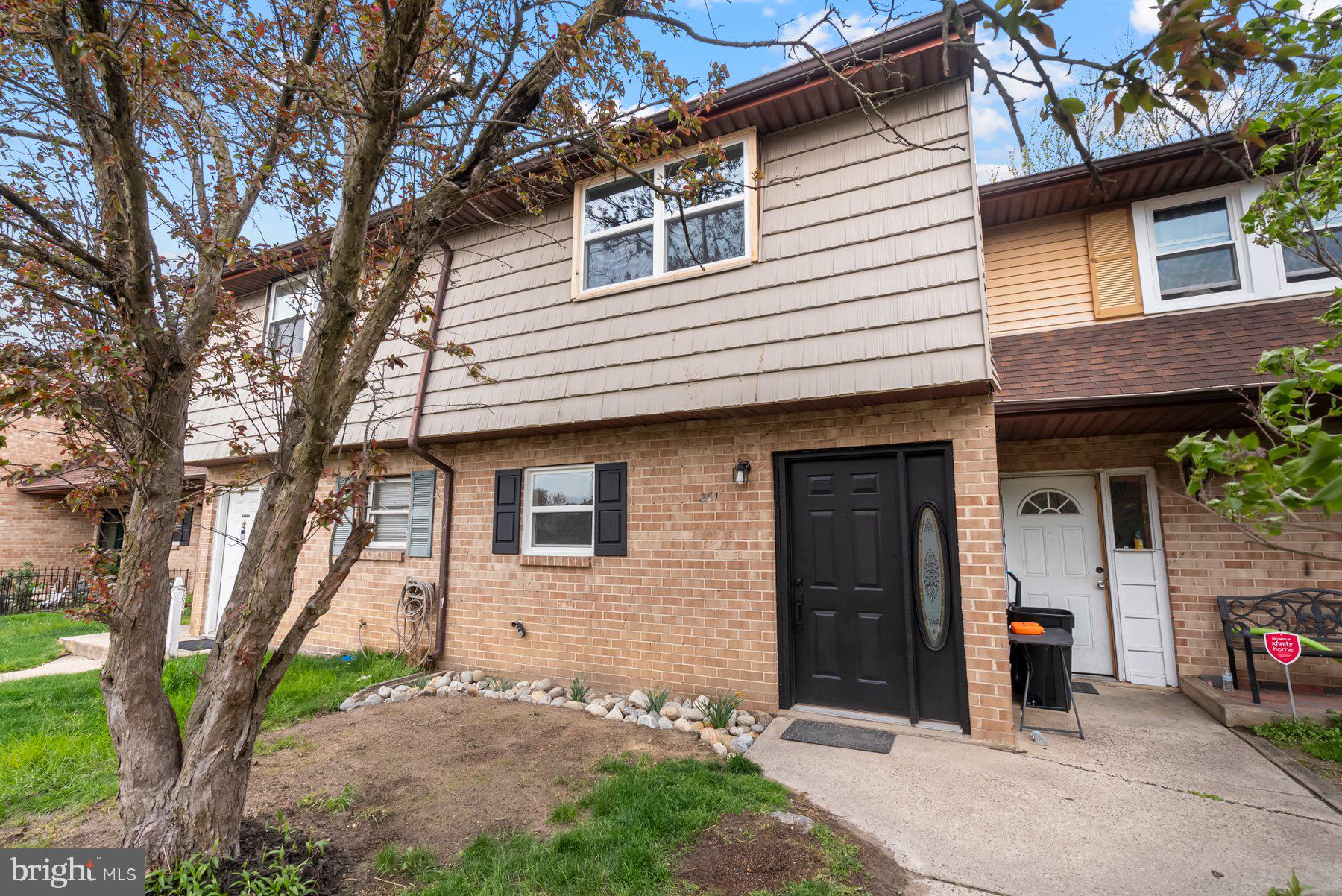 261 Via Cascata Drive Clementon, NJ 08021 - Photo 26 of 26 a front view of a house with a tree