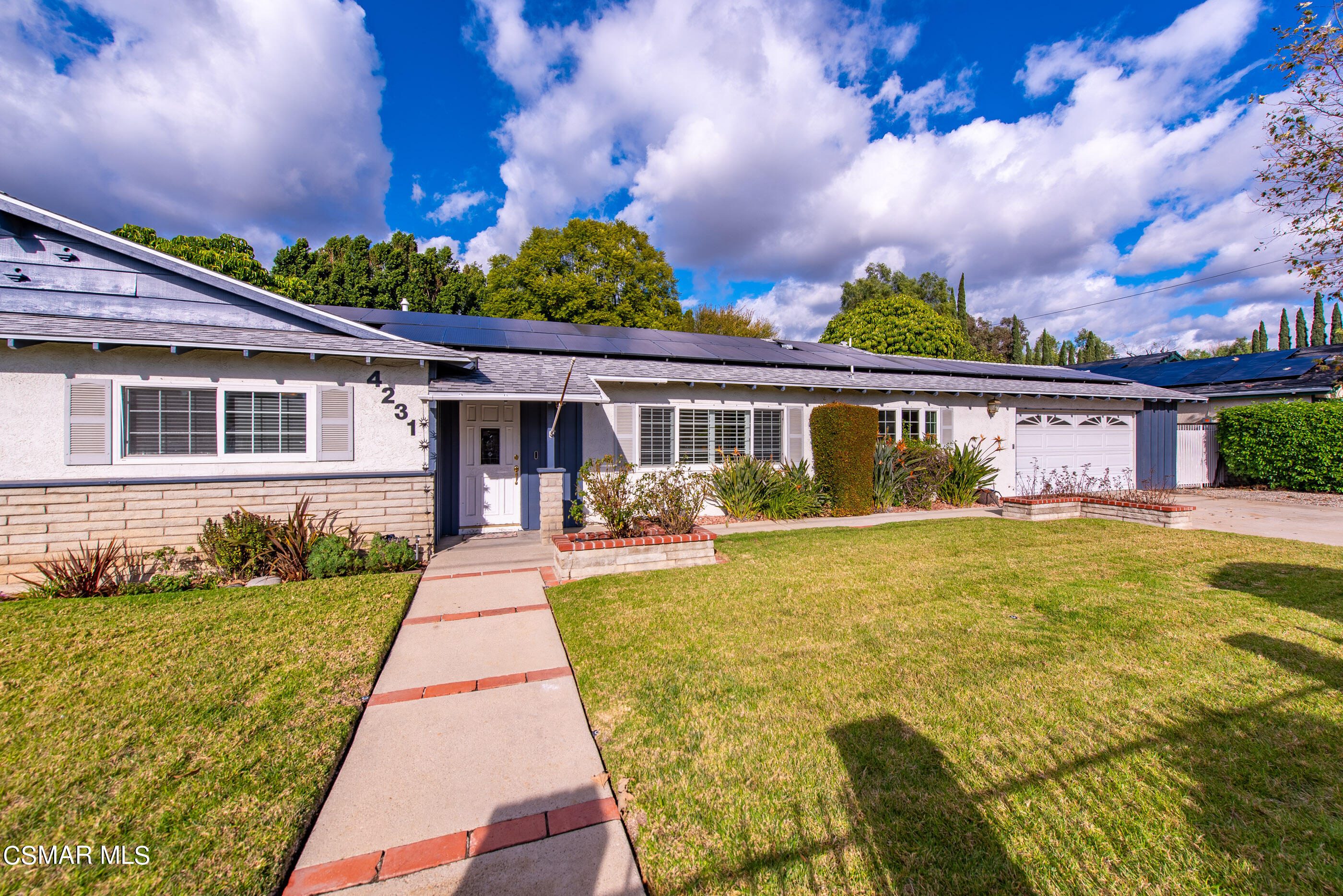 4231 Apricot Road Simi Valley, CA 93063 - Photo 1 of 1 a front view of a house with swimming pool having outdoor seating