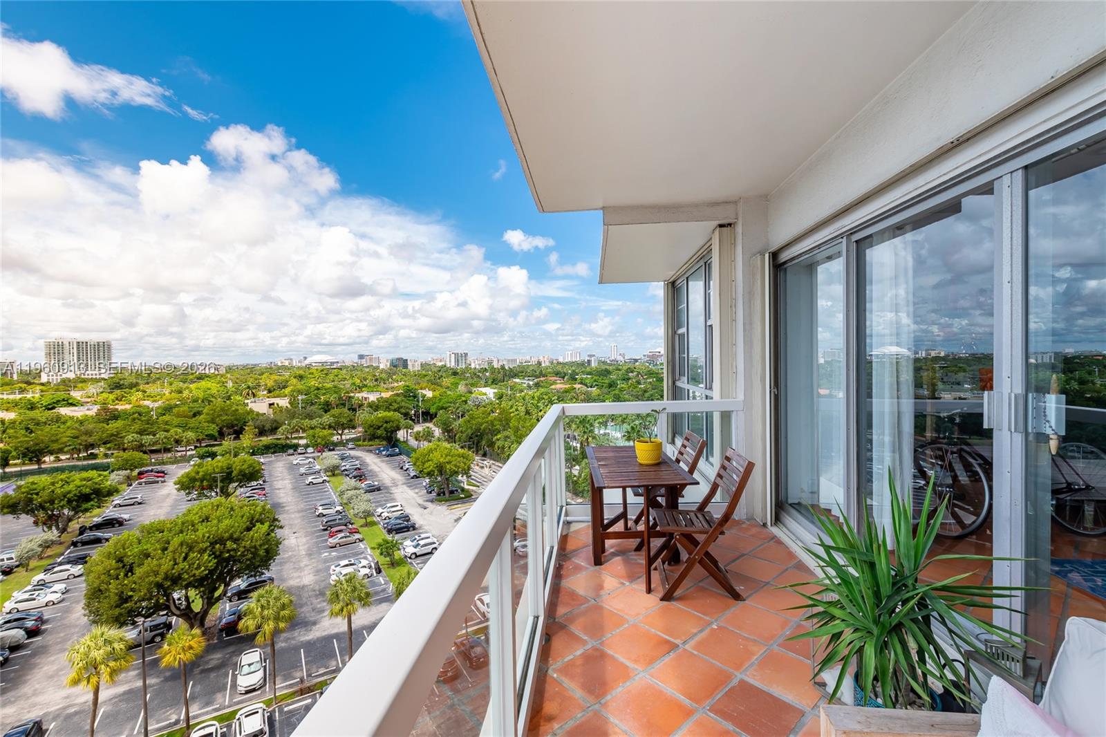 a view of balcony with furniture