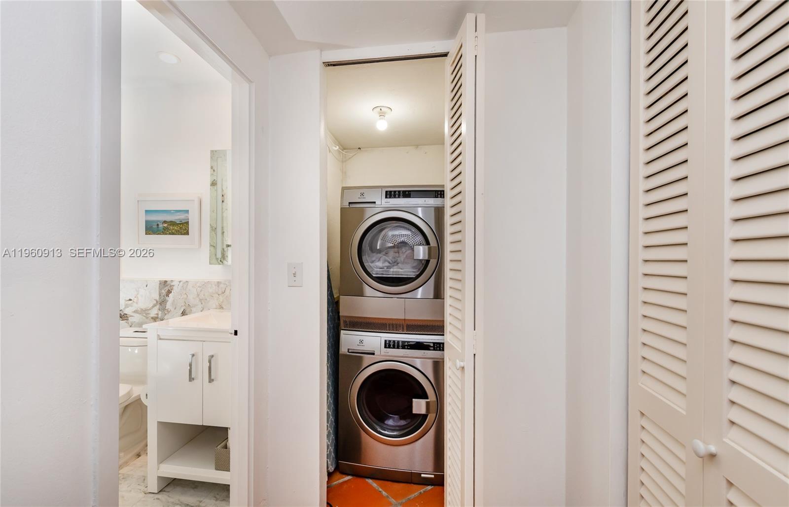 2451 Brickell Avenue, Unit 10K Miami, FL 33129 - Photo 12 of 25 a view of washer and dryer in a utility room