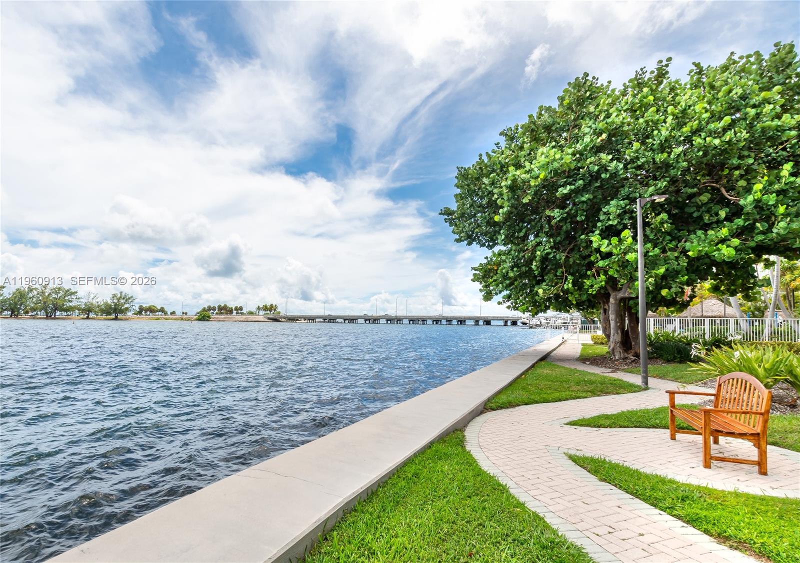 2451 Brickell Avenue, Unit 10K Miami, FL 33129 - Photo 16 of 25 a view of a lake with a garden