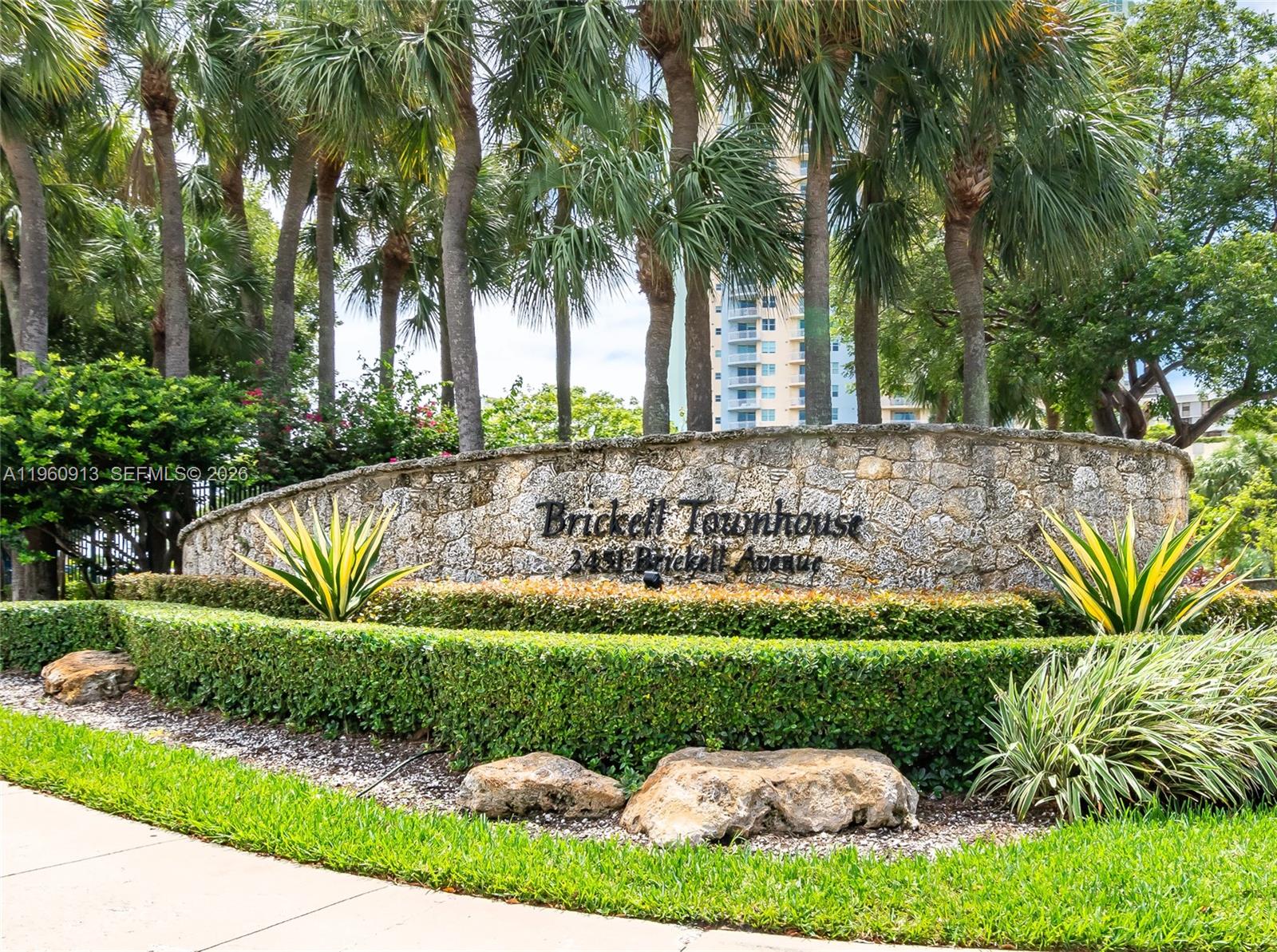 2451 Brickell Avenue, Unit 10K Miami, FL 33129 - Photo 17 of 25 a view of a garden with palm trees