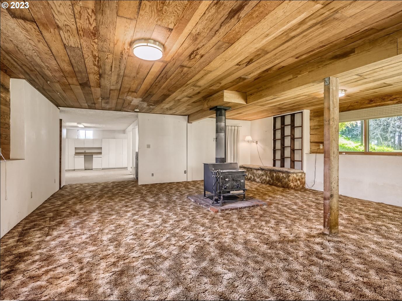 18331 Northwest Reeder Road Portland, OR 97231 - Photo 29 of 46 a view of an empty room and window