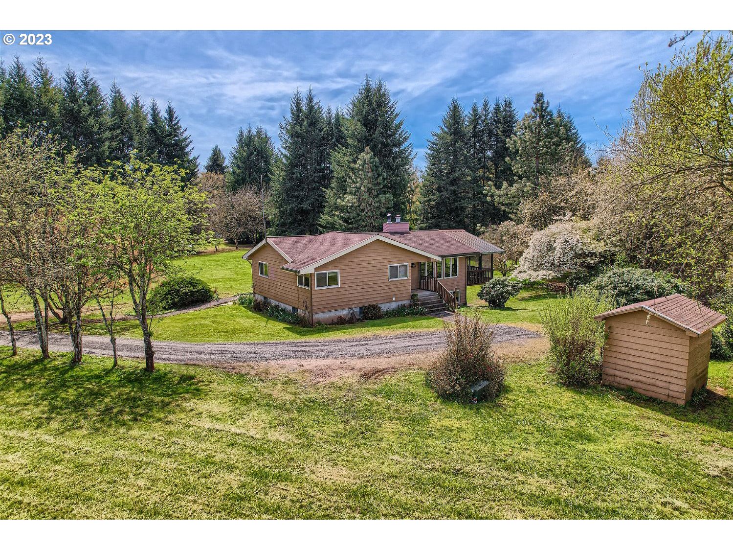 18331 Northwest Reeder Road Portland, OR 97231 - Photo 40 of 46 a aerial view of a house with a yard