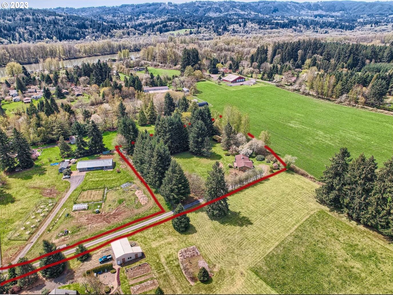 18331 Northwest Reeder Road Portland, OR 97231 - Photo 43 of 46 an aerial view of a house with a swimming pool