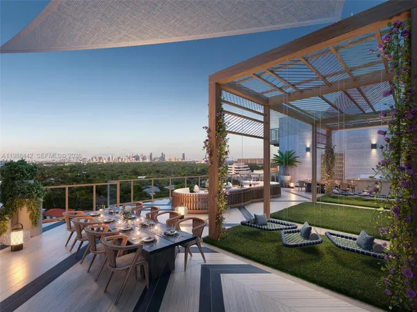 a view of a house with patio and outdoor seating